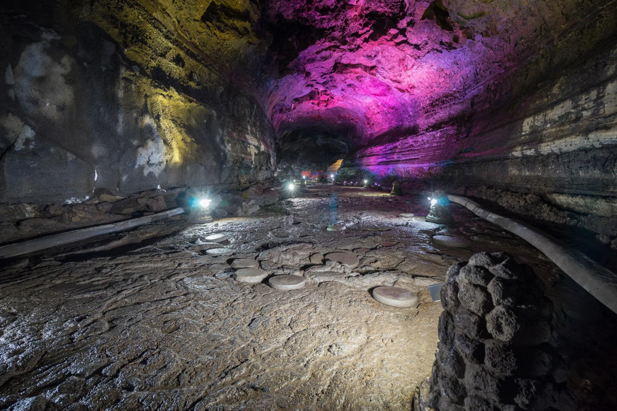 Jeju Island lava tubes Manjanggul cave interior coloured lighting South Korea